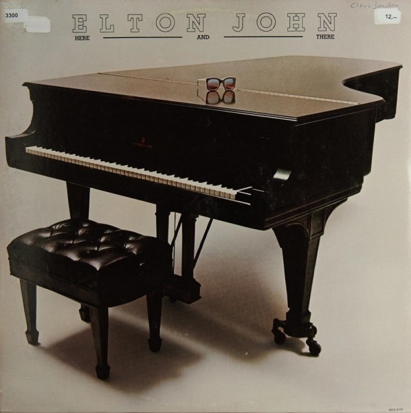 John, Elton: Here and There