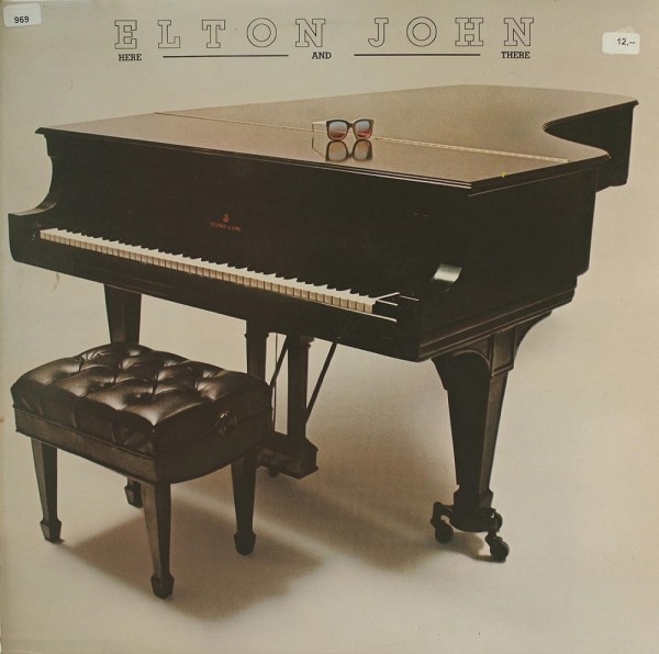 John, Elton: Here and There